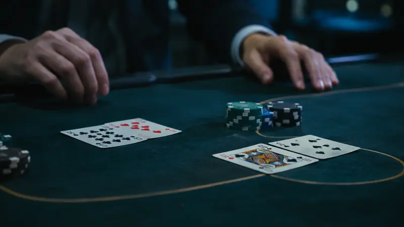 Banker and Player hands on a baccarat table